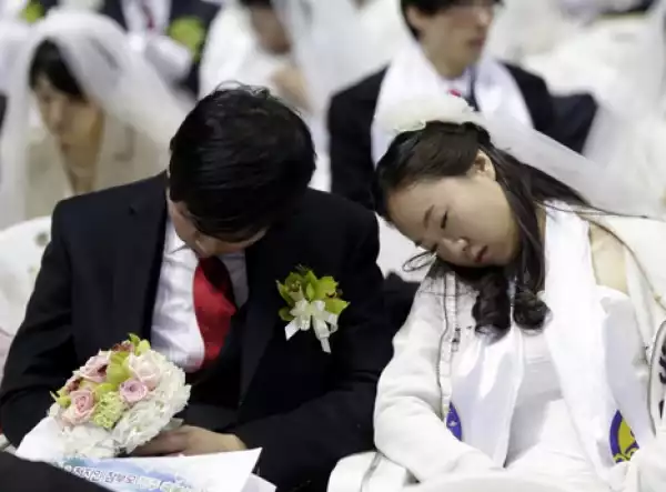 Lol!! Husband And Wife Fall Asleep Openly During Their Wedding [See Photo]